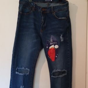 Distressed skinny blue jeans
